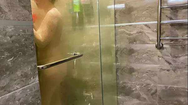 A young pervert looked at his stepmother in the shower