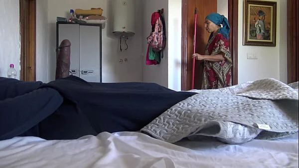 A Turkish hotel maid is disturbed when tourist shows his big black cock
